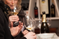 The teams analyze the scent and taste of the wines
