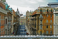 Street with many impressive palaces in Genoa