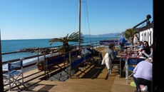 Relaxing in a bar at the Ligurian sea
