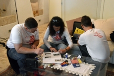 The teams have to write, draw and paste the guide-books